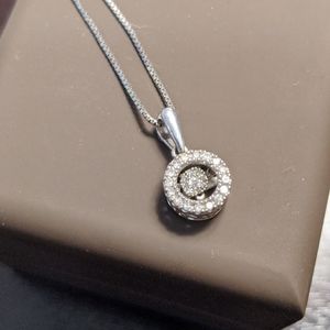 Key Jewelers diamond pendant and silver necklace